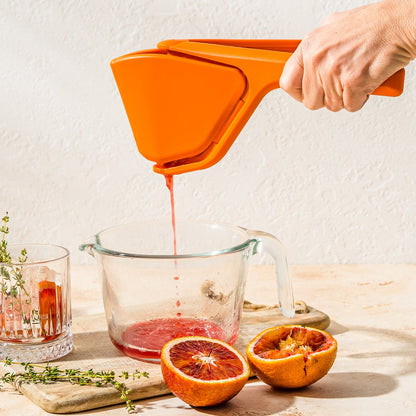 Orange Fluicer - Fold Flat Easy Juicer